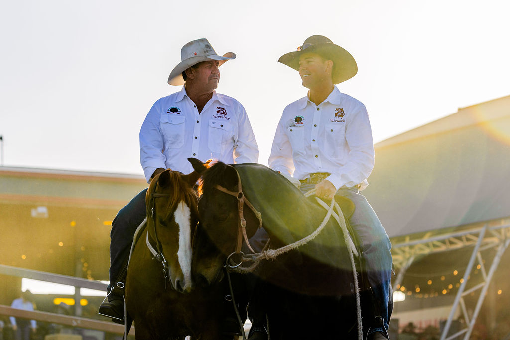 Two ACA riders competing at golden hour